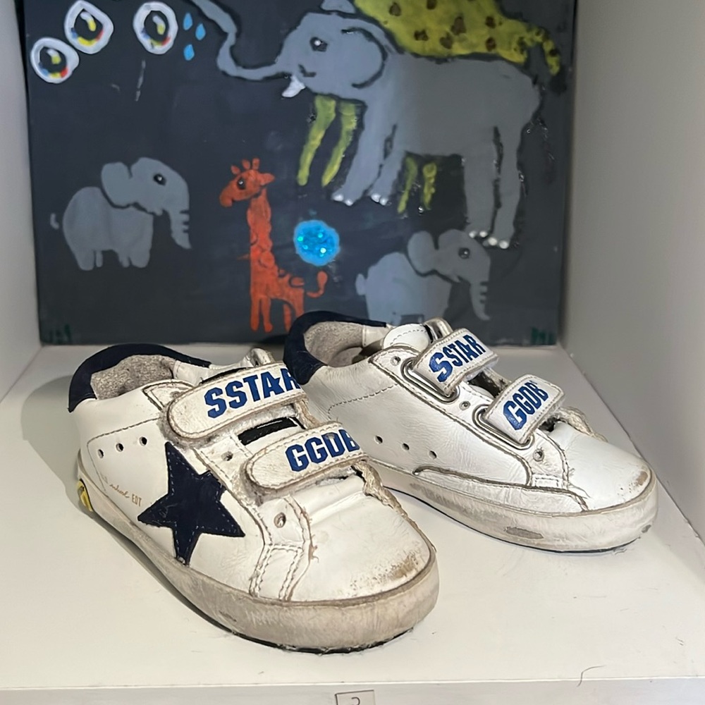 Toddler Golden Goose Sneakers. Sneakers were designed to look damaged and worn.